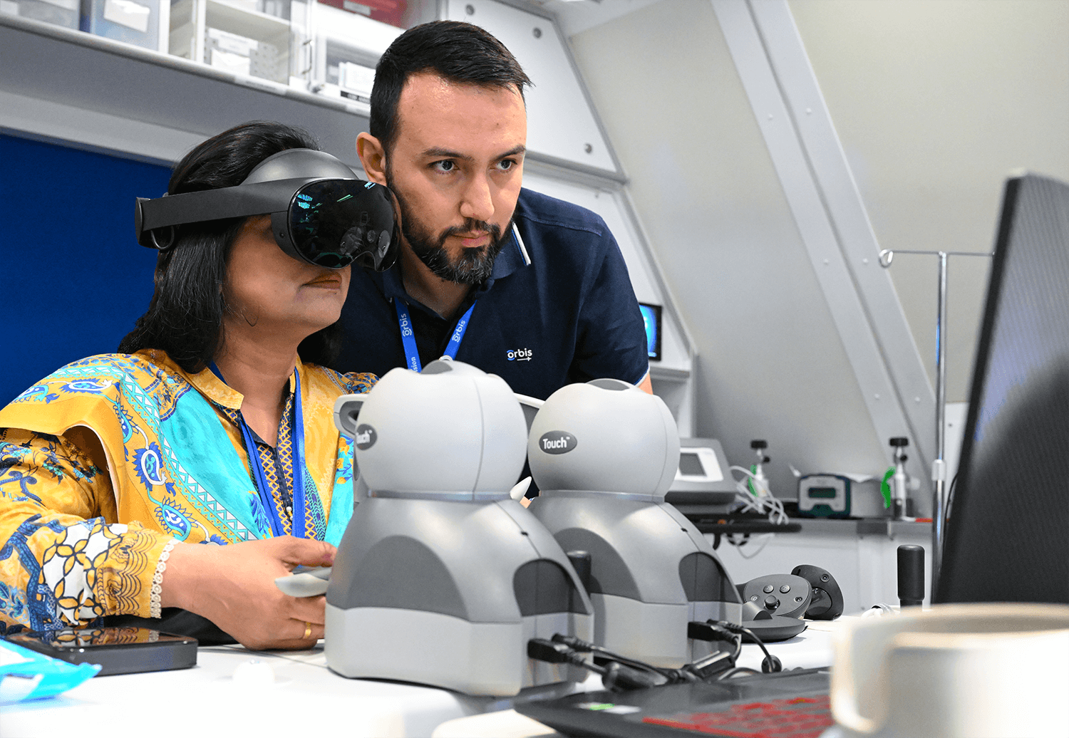 Surgeon rehearsing a procedure with HapticVR force feedback in the ophthalmology simulation